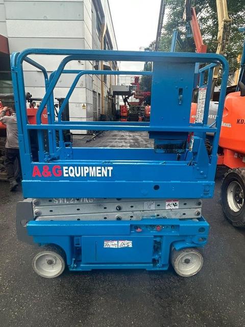 Genie scissor lift with A&G Equipment branding, ready for site delivery in Johor